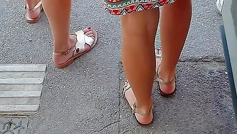 Beautiful Legs And Feet In Sandals Of Two Attractive Young Women Beautiful Legs And Feet In Sandals Of Two Attractive Young Women