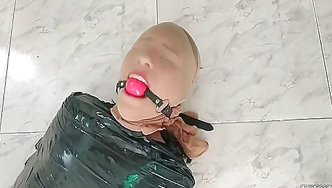 Tape Mummified Girl Pantyhose Hooded And Ball Gagged